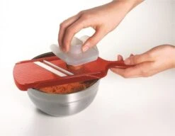 Kyocera Slicer Set With Mandoline Slicer, Julienne Slicer, & Grater 11 Kyocera Slicer Set With Mandoline Slicer, Julienne Slicer, & Grater -Sharp Haus Store kyocera slicer set mandoline slicer julienne slicer grater 4